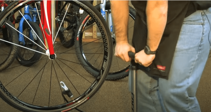 how to inflate a road bike tire
